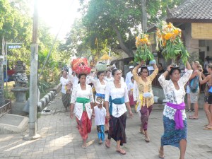 On their way to make offerings at the local temple