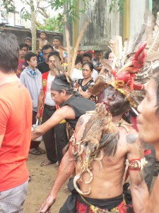 Preparing to demonstrate strength on the chair of knives