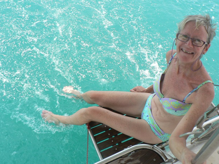 Escaping the dunking by dabbling my feet in equatorial water (it was incredibly warm)